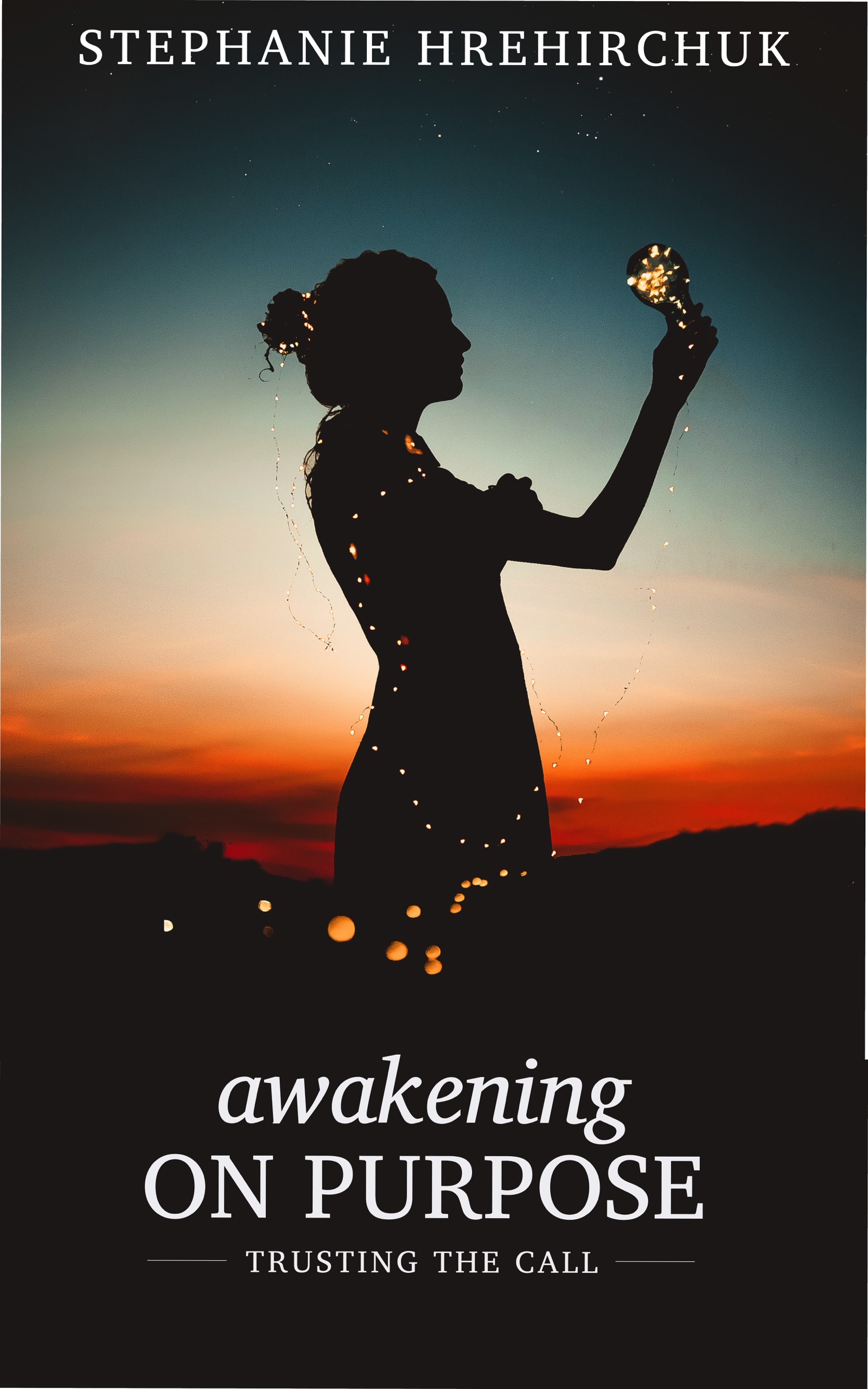 The cover of the book Awakening on Purpose: the outline of a woman at sunset. She holds a bulb filled with fairy lights.