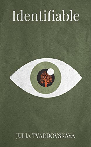 A green eye with an orange tree inside of it on a green background. Identifiable written across the top and Julia Tvardovskaya written across the bottom.