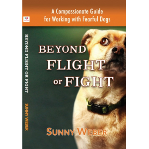 A Picture of a Fearful Dog--wide-eyed, doubtful, leaning away in insecurity.