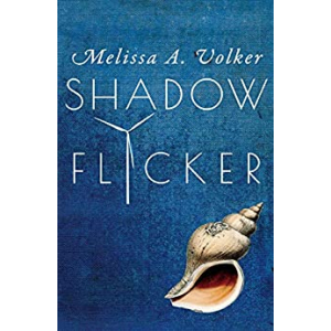 Dark blue background with a cream seashell on the bottom right. Author name, Melissa A. Volker above book title, Shadow Flicker, in white text, with a wind turbine in place of the letter I