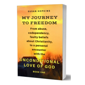 A mockup of a 6x9 paperback book cover which features an orangey night sky, a dark silhouette of a building and trees along the bottom, and a bright yellow sun pillar in the shape of a cross which highlights text ~ the author's name Susan Hopkins and the title of the book