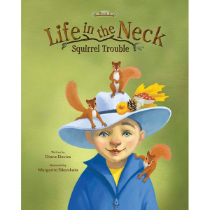 Eli with large hat and 3 squirrels on his hat and shoulder.