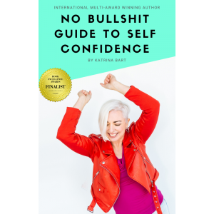 A woman arms up celebrating her self confidence