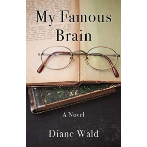 Two books with wire-framed eyeglasses resting on top